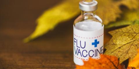 a vial that says flu vaccine